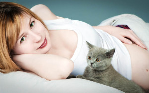 Pregnant woman in bed