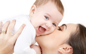 picture of happy mother with baby over white